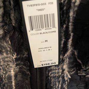 Lad BCBG black fashion skirt with gorgeous grey inlay and full length zipper.NWT